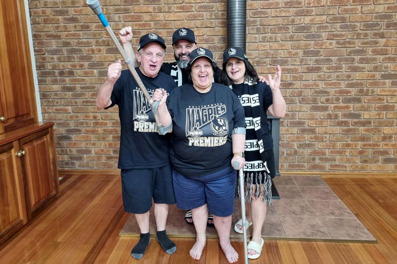 Collingwood fan ready to cheer with family